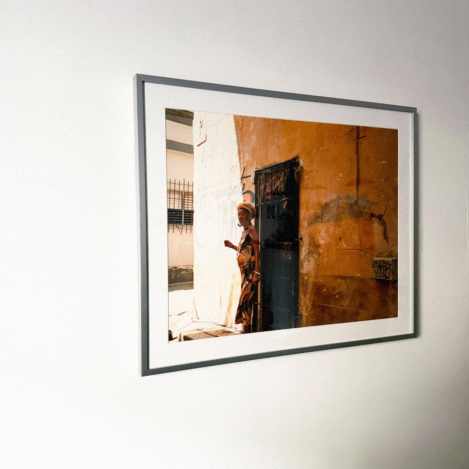 Framed documentary photograph exhibited at Cholita
